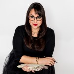 Photograph of Krista Torralva on a white background